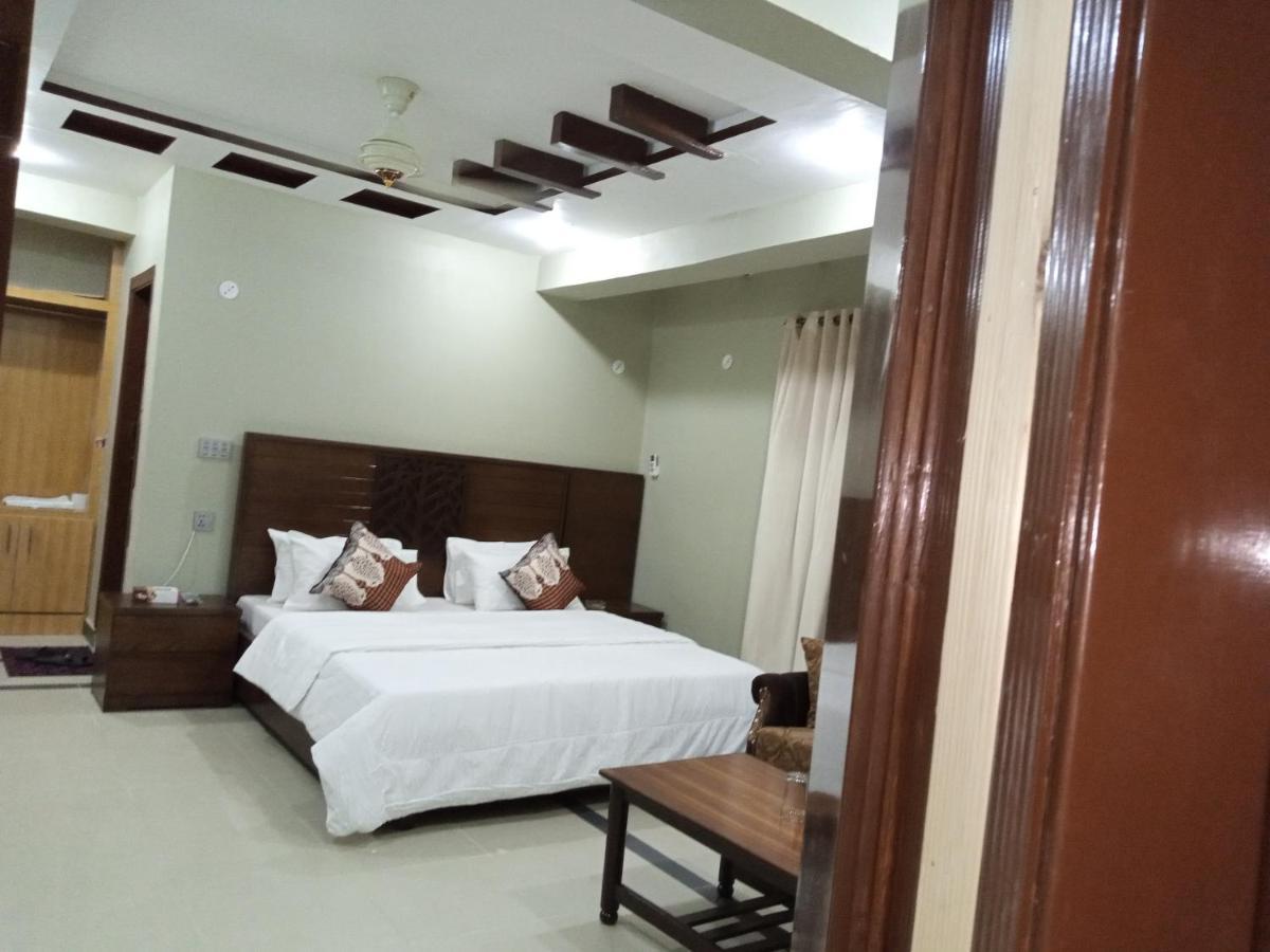 Hotel Al Markaz Исламабад Экстерьер фото